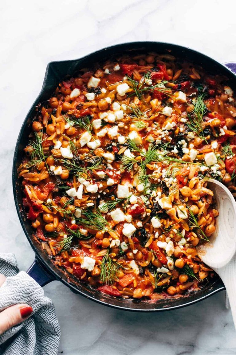 Greek baked orzo in a skillet.