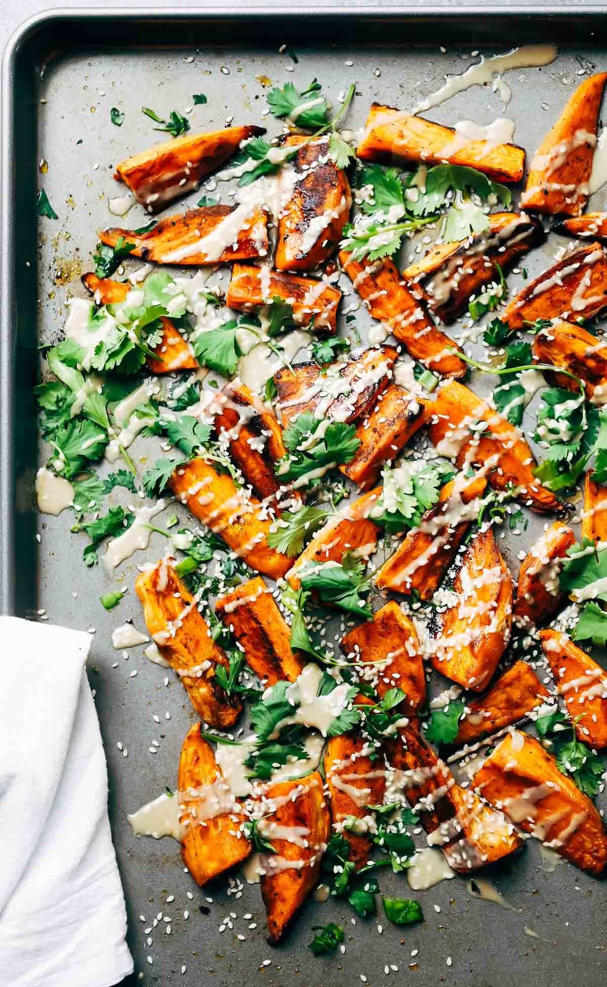 Roasted Sweet Potatoes on a sheet pan.